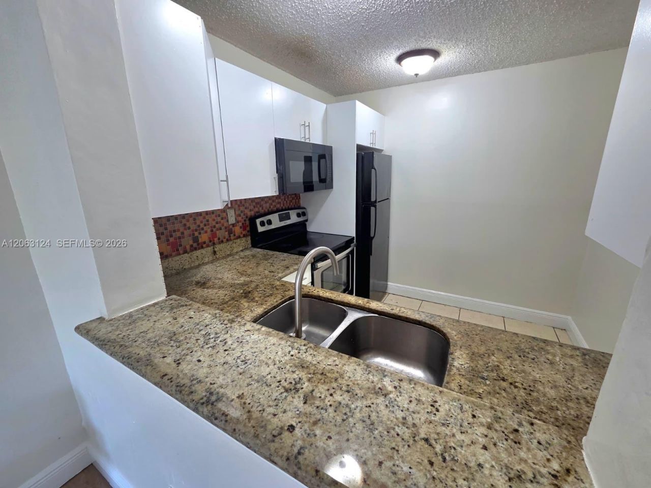 482 NW 165th St Rd , Unit A306, Miami, FL 33169 Photo