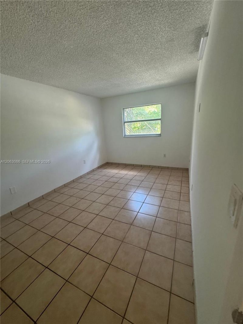 4265 NW South Tamiami Canal Dr, Unit 1-214, Miami, FL 33126 Photo