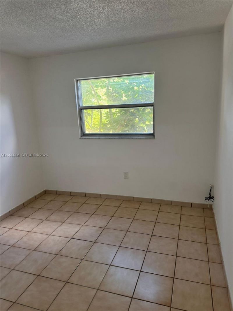 4265 NW South Tamiami Canal Dr, Unit 1-214, Miami, FL 33126 Photo