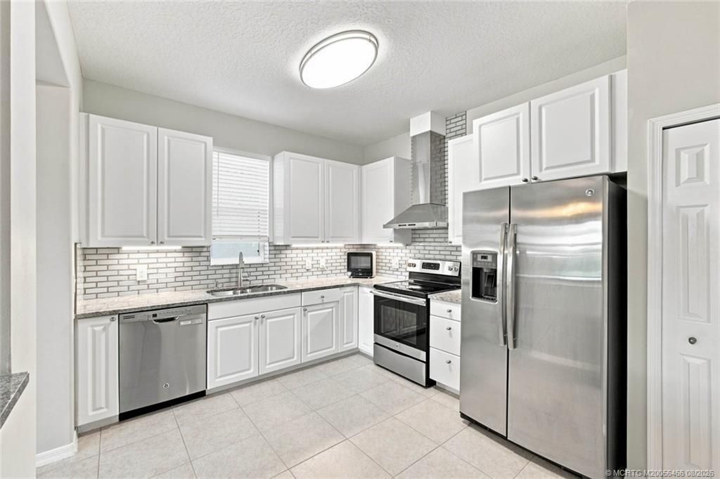 3694 NW Pin Oak Drive, Jensen Beach, FL 34957 Photo