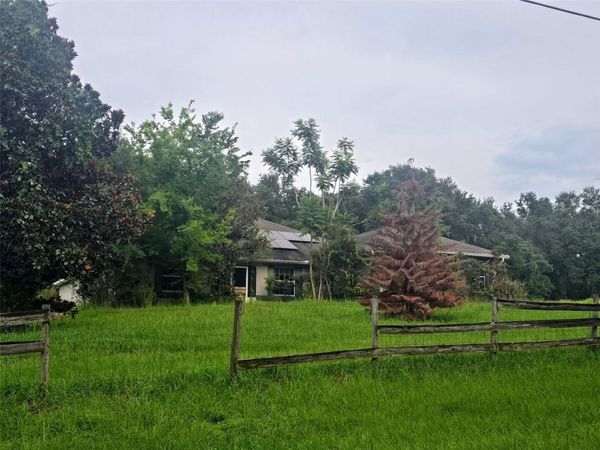 310 TOMATO HILL ROAD , LEESBURG, FL 34748