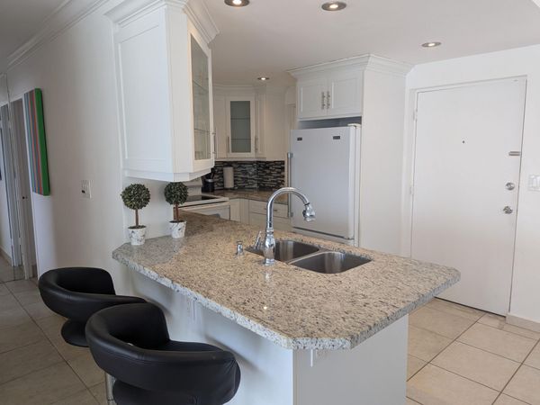 220 KINGS POINT Drive, Unit 501, Sunny Isles Beach, FL 33160