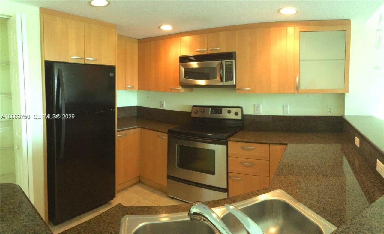201 Golden Isles Dr, Unit 409, Hallandale Beach, FL 33009 Photo