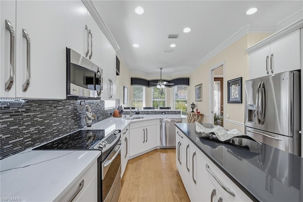 9097 Troon Lakes Dr, Naples, FL 34109 Photo