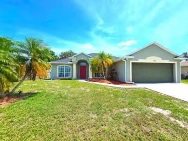 302 NE Greenbrier Avenue, Port St. Lucie, FL 34983