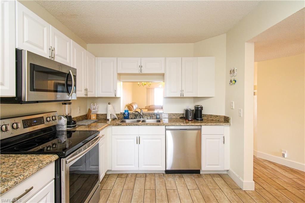 7794 Emerald Cir , Unit A-102, Naples, FL 34109 Photo