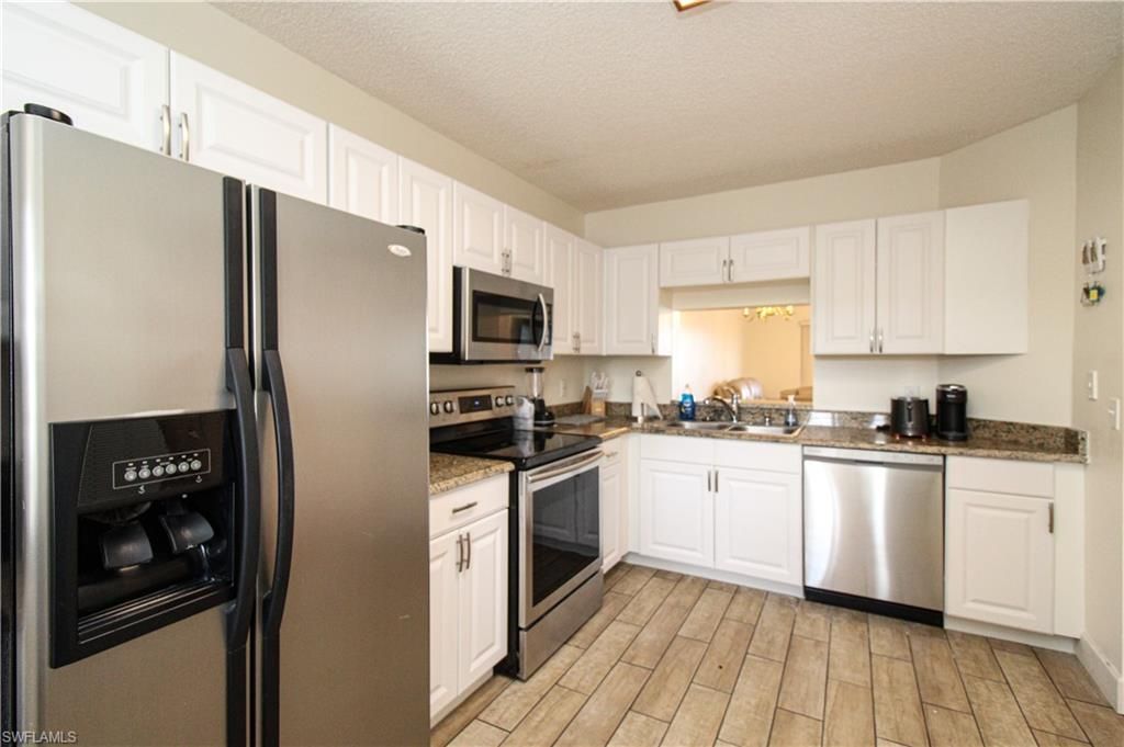 7794 Emerald Cir , Unit A-102, Naples, FL 34109 Photo