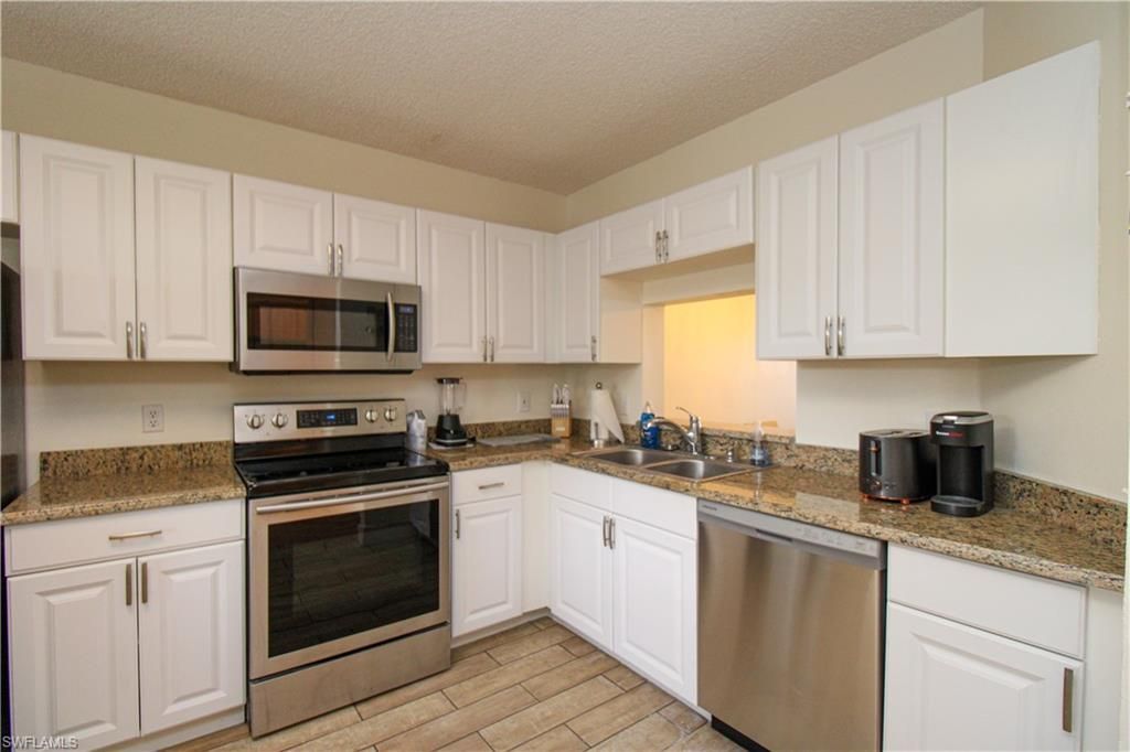7794 Emerald Cir , Unit A-102, Naples, FL 34109 Photo