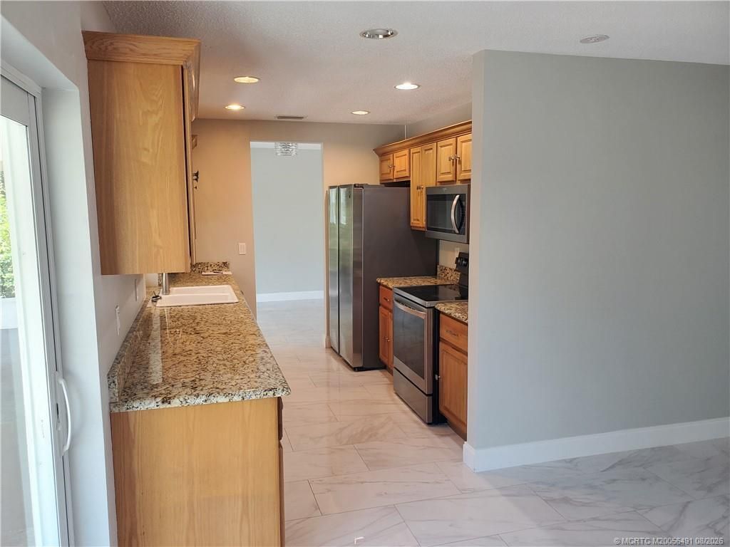 1257 NE Sago Drive, Jensen Beach, FL 34957 Photo