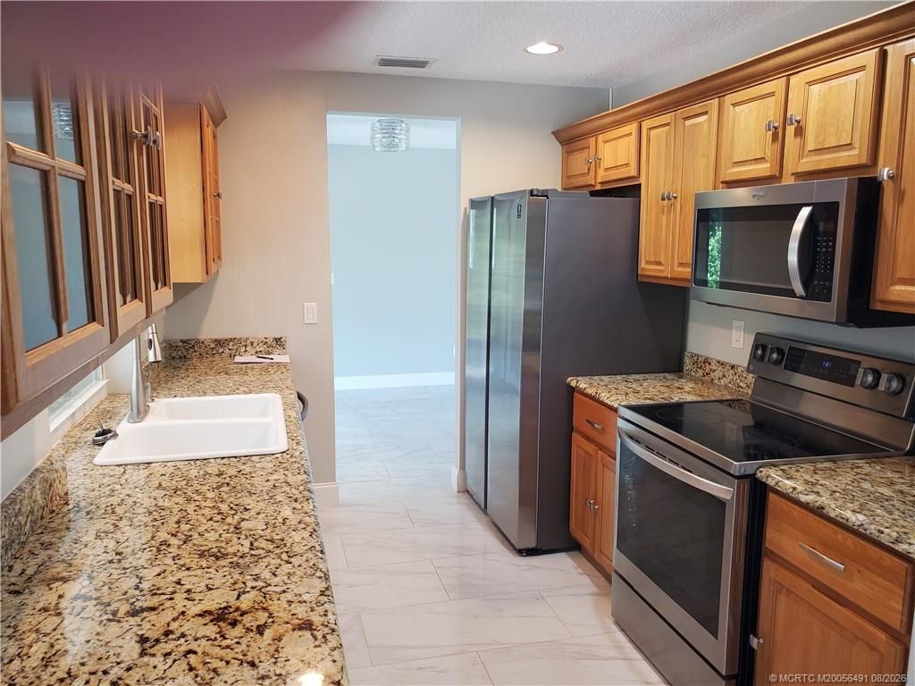 1257 NE Sago Drive, Jensen Beach, FL 34957 Photo