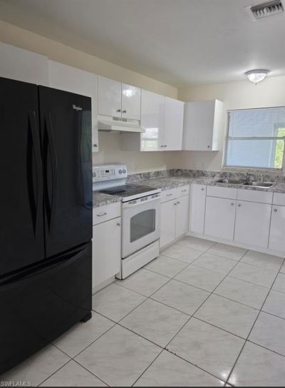 245 Meadow Rd , Lehigh Acres, FL 33973 Photo