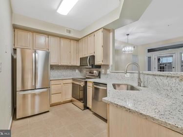 1319 GARDEN WALL COURT, Unit 404, RESTON, VA 20194
