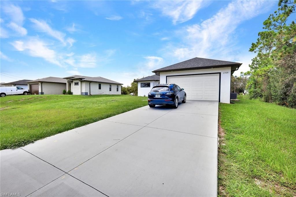 2709 53rd St Sw, Lehigh Acres, FL 33976 Photo