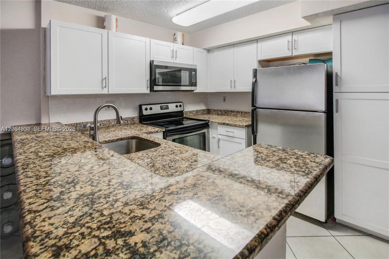 831 Lyons Rd , Unit 23101, Coconut Creek, FL 33063 Photo