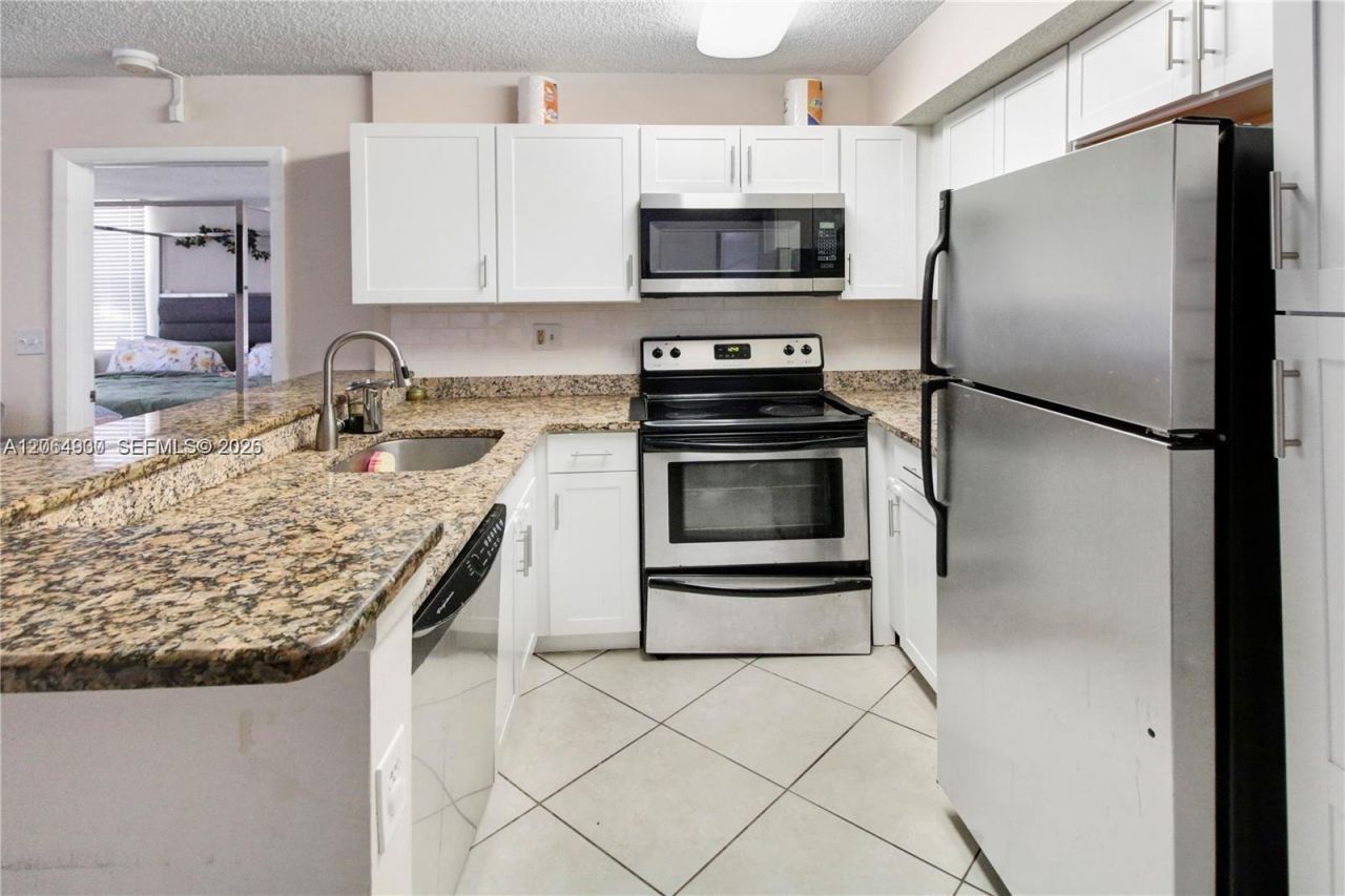 831 Lyons Rd , Unit 23101, Coconut Creek, FL 33063 Photo