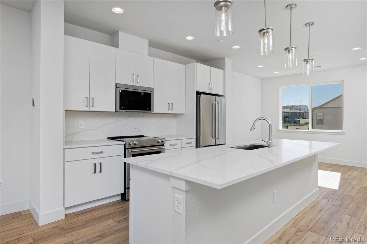 3119 W Bates Avenue, Denver, CO 80236 Main Photo