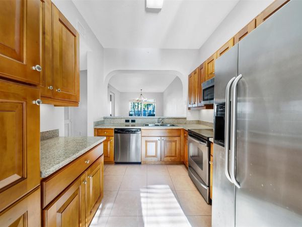 3500 OAKS CLUBHOUSE Drive, Unit 102, Pompano Beach, FL 33069