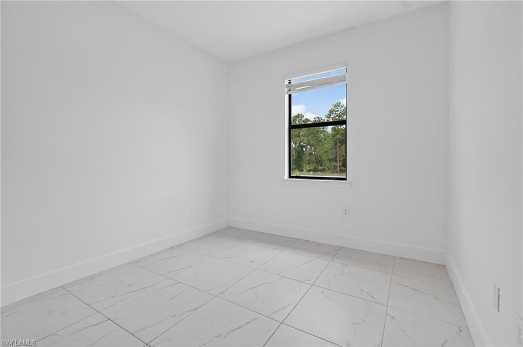 909/911 Homestead Rd S, Lehigh Acres, FL 33974 Photo