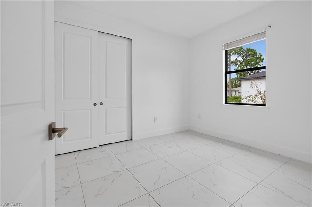 909/911 Homestead Rd S, Lehigh Acres, FL 33974 Photo