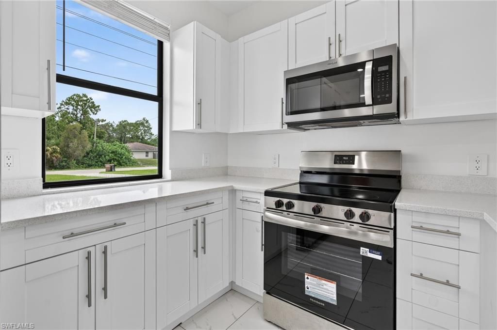 909/911 Homestead Rd S, Lehigh Acres, FL 33974 Photo