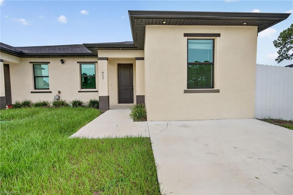 909/911 Homestead Rd S, Lehigh Acres, FL 33974 Photo