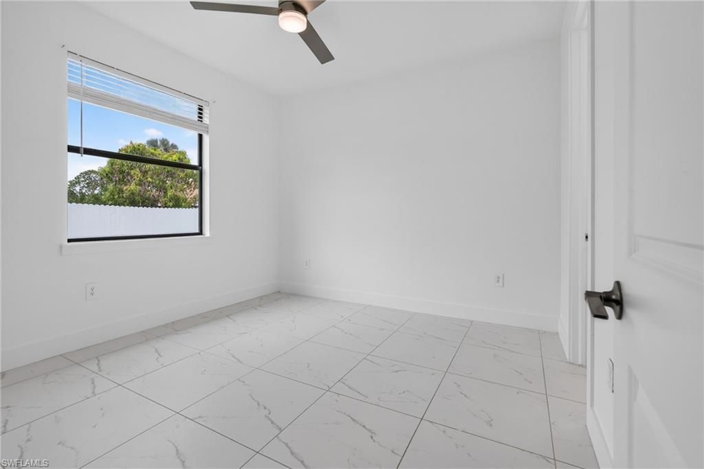909/911 Homestead Rd S, Lehigh Acres, FL 33974 Photo