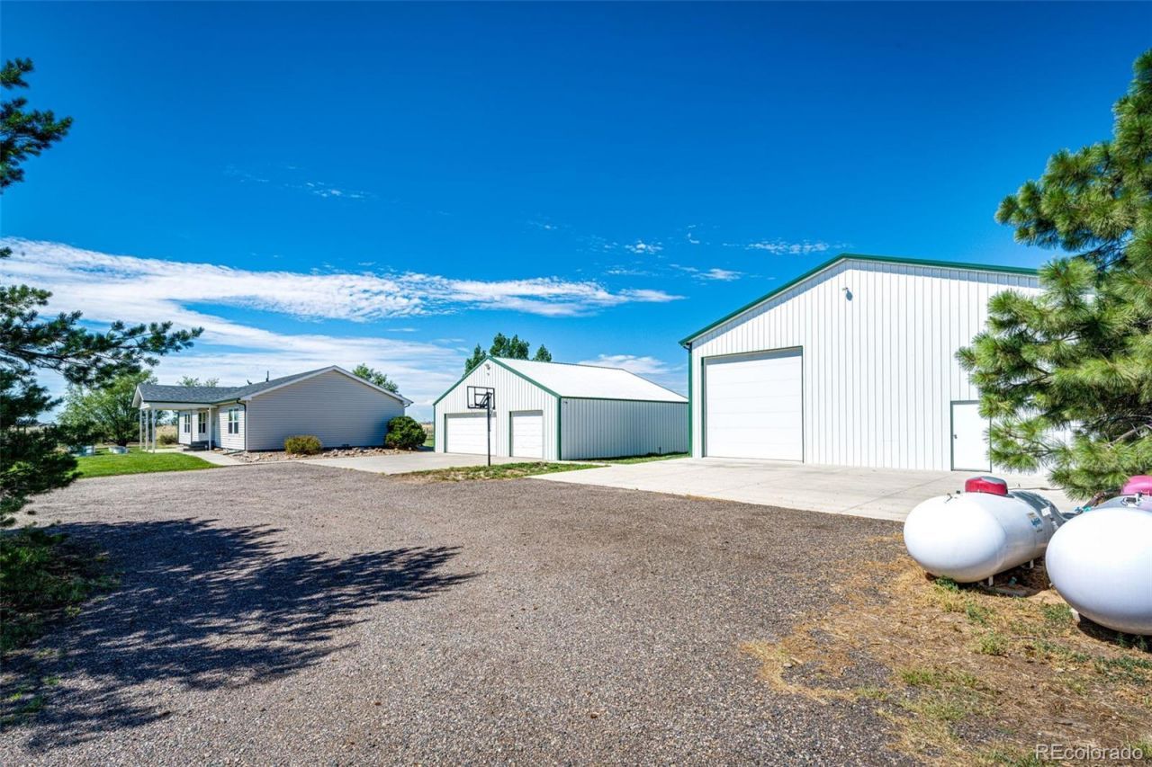 56054 E Virginia Place, Strasburg, CO 80136 Main Photo