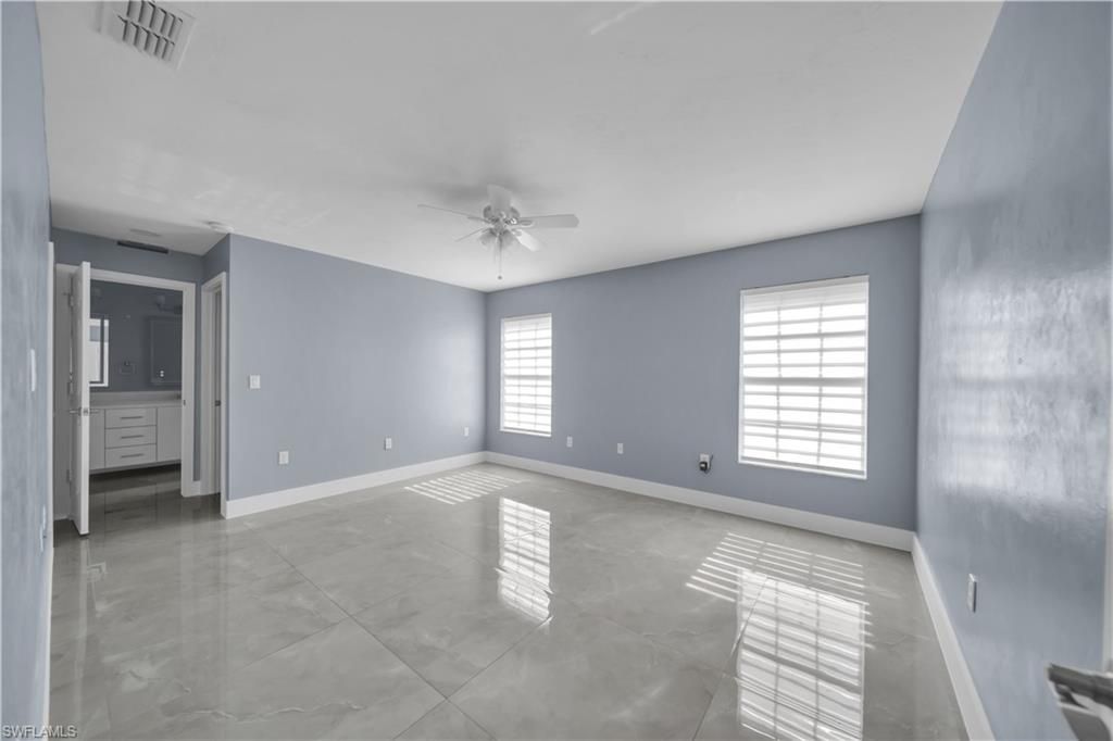 538 Whispering Wind Bend, Lehigh Acres, FL 33974 Photo