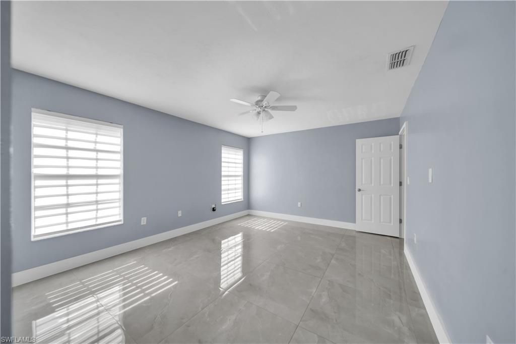 538 Whispering Wind Bend, Lehigh Acres, FL 33974 Photo