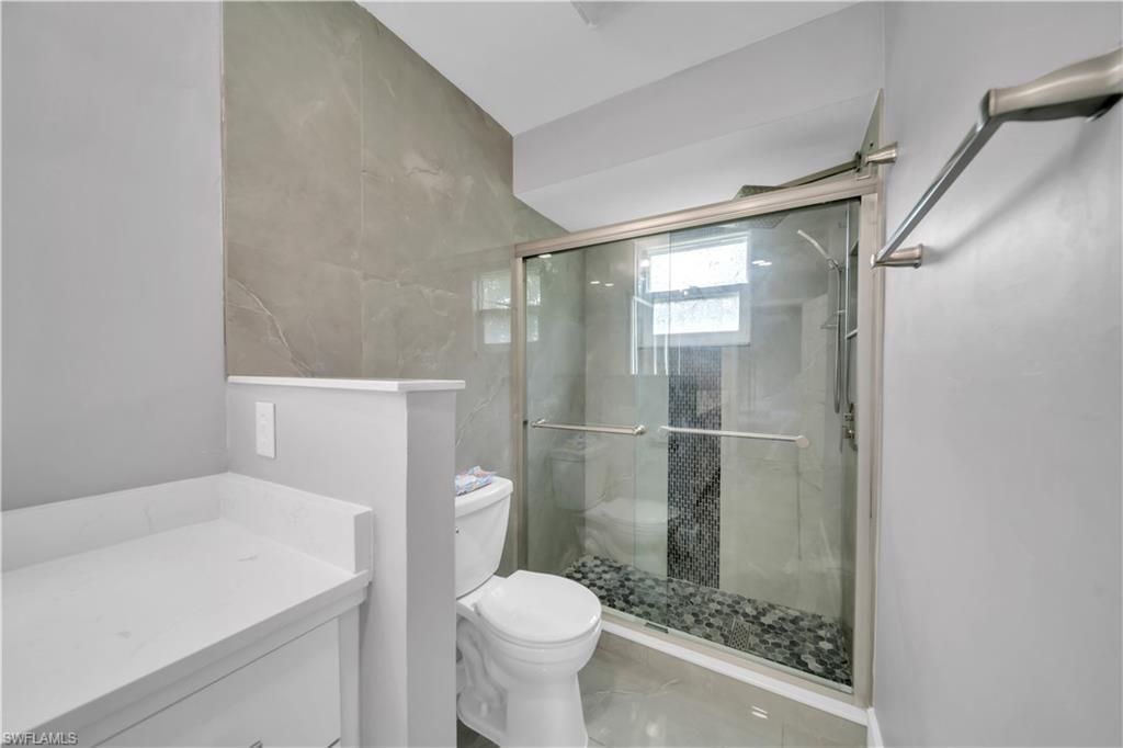 538 Whispering Wind Bend, Lehigh Acres, FL 33974 Photo