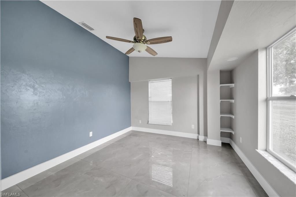 538 Whispering Wind Bend, Lehigh Acres, FL 33974 Photo