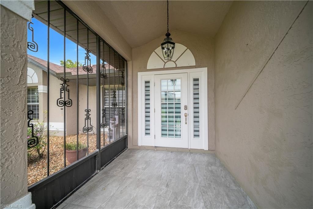 538 Whispering Wind Bend, Lehigh Acres, FL 33974 Photo