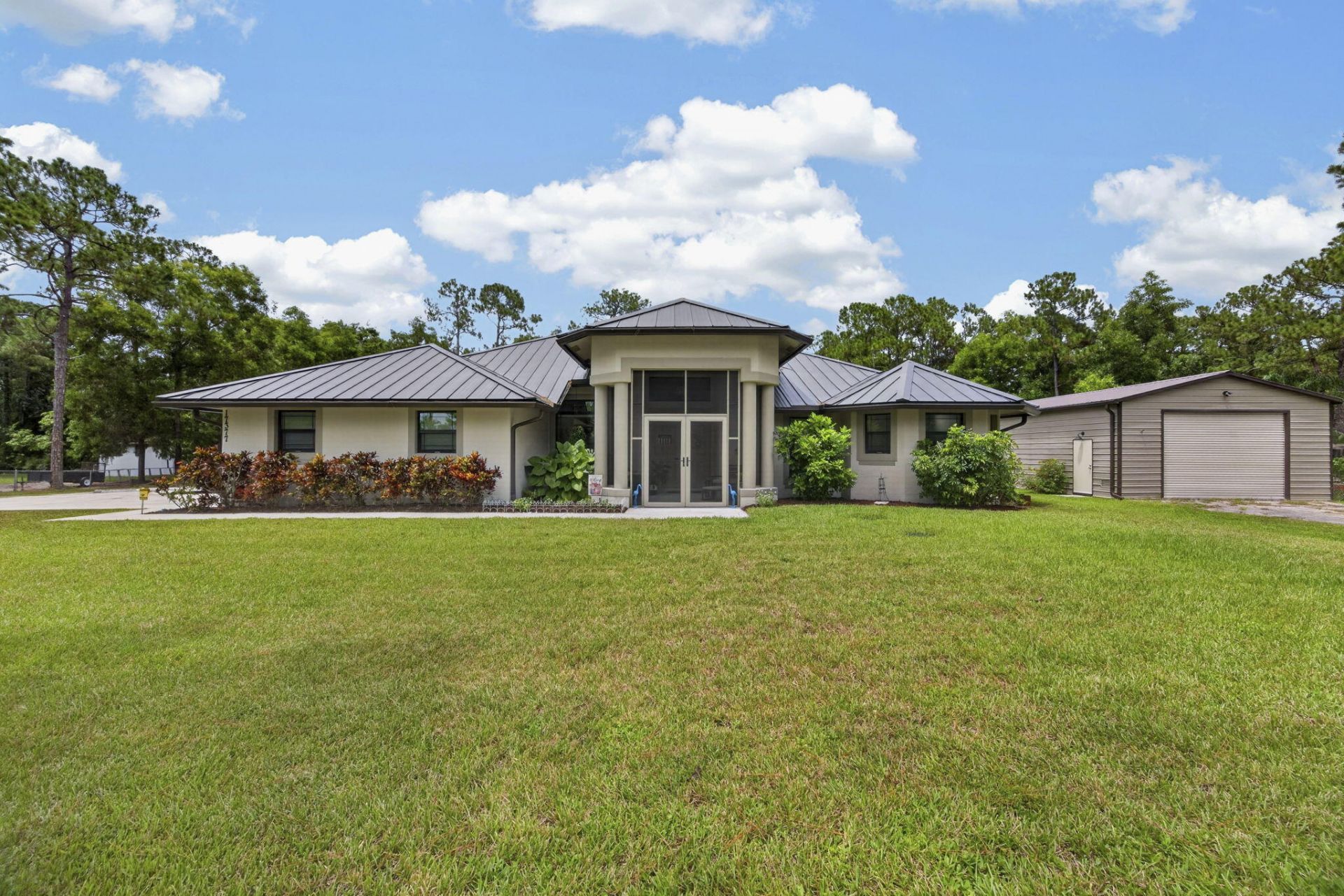 17377 W Alan Black Boulevard, The Acreage, FL 33470 Photo