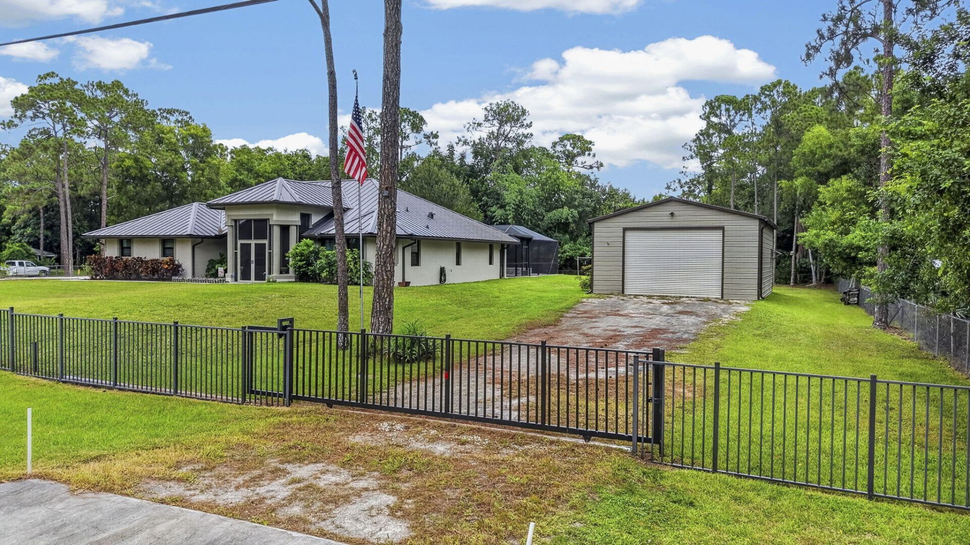 17377 W Alan Black Boulevard, The Acreage, FL 33470 Photo