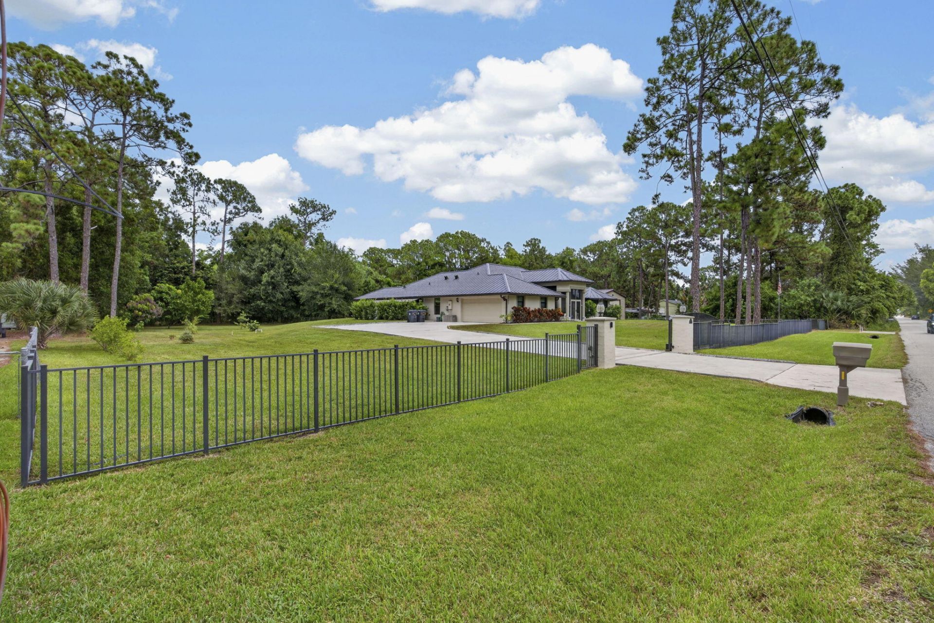 17377 W Alan Black Boulevard, The Acreage, FL 33470 Photo