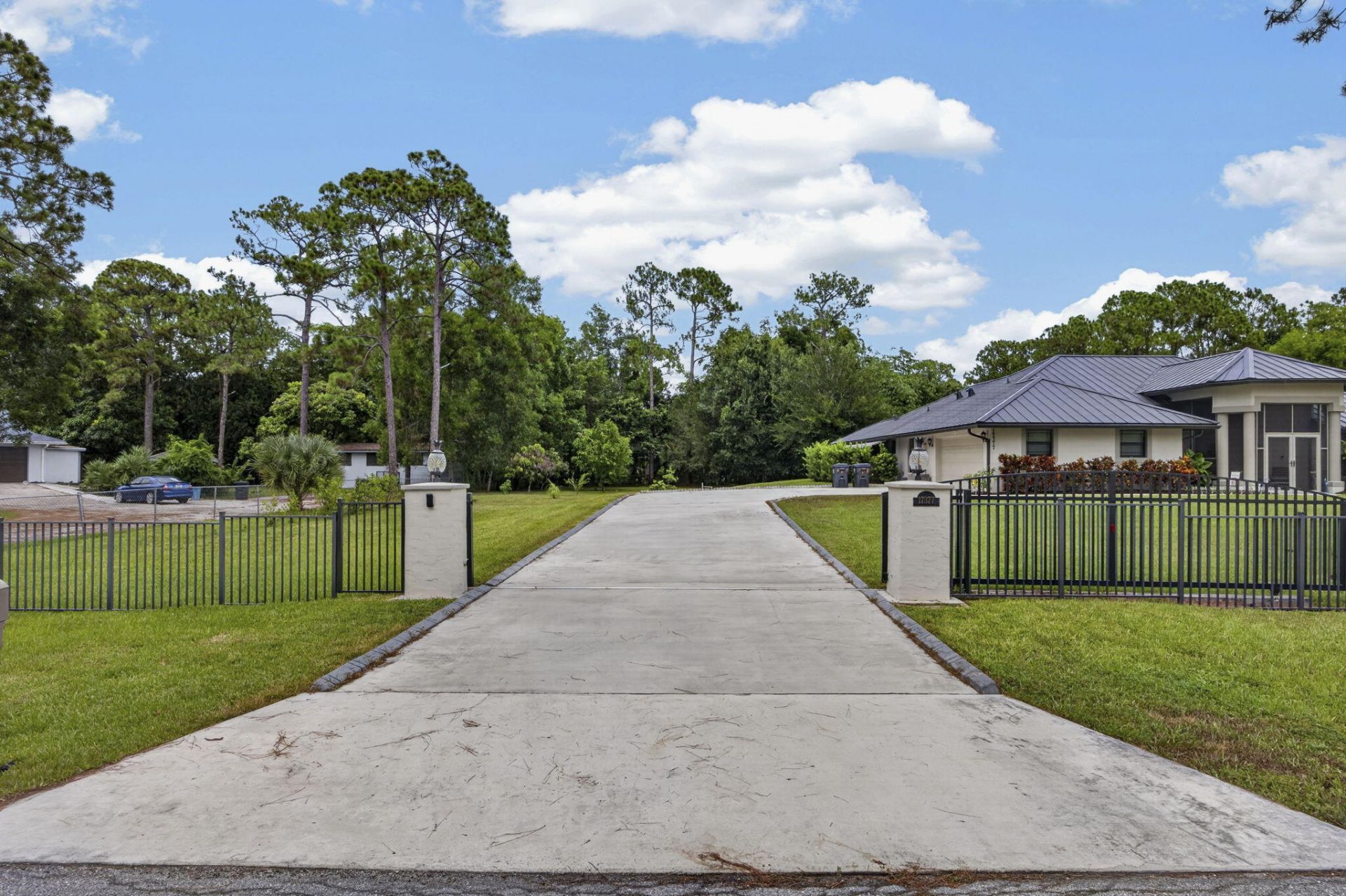 17377 W Alan Black Boulevard, The Acreage, FL 33470 Photo