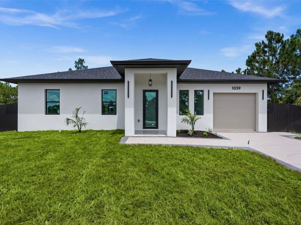 1039 BASSINGER AVENUE S, LEHIGH ACRES, FL 33974
