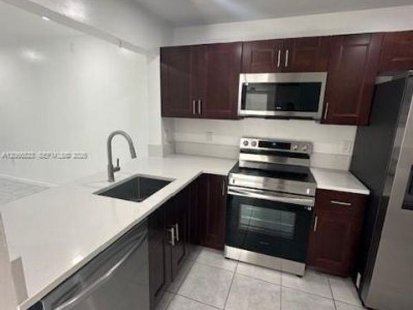 861 NE 207th Ln , Unit 201-14, Miami, FL 33179
