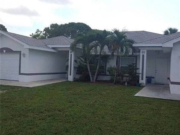 211/213 SE 24th AVE, CAPE CORAL, FL 33990