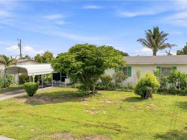 803 Perry AVE, LEHIGH ACRES, FL 33936
