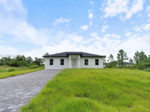 710 Peacock Ave , Lehigh Acres, FL 33974