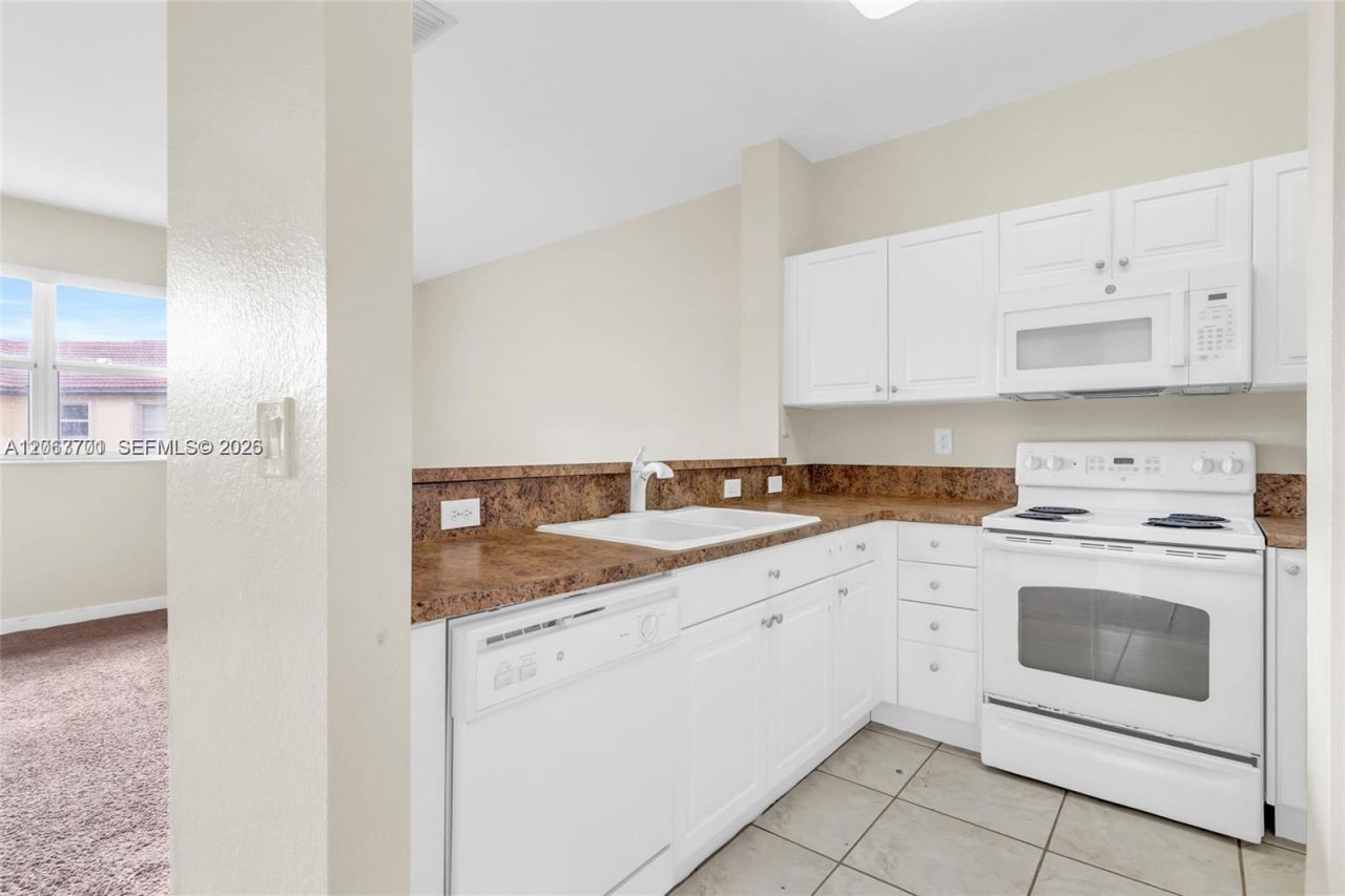 1395 NE 33rd Ave , Unit 206-26, Homestead, FL 33033 Photo