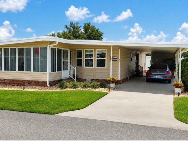 104 CALADIUM STREET, LEESBURG, FL 34748