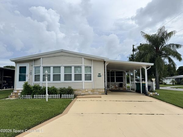 600 N Dolphin Circle , Barefoot Bay, FL 32976