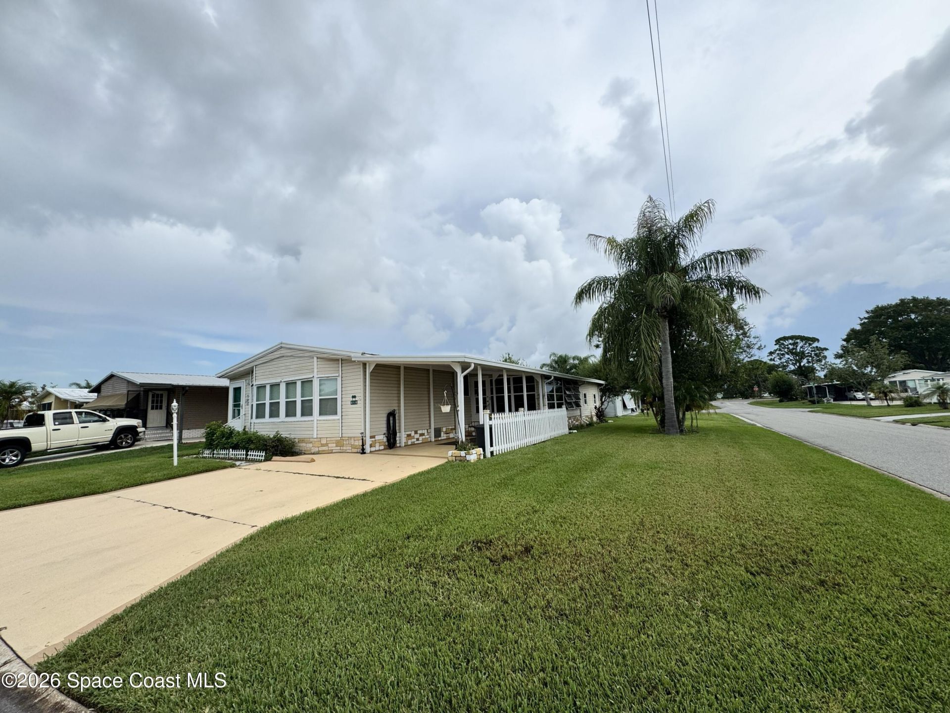 600 N Dolphin Circle , Barefoot Bay, FL 32976 Photo