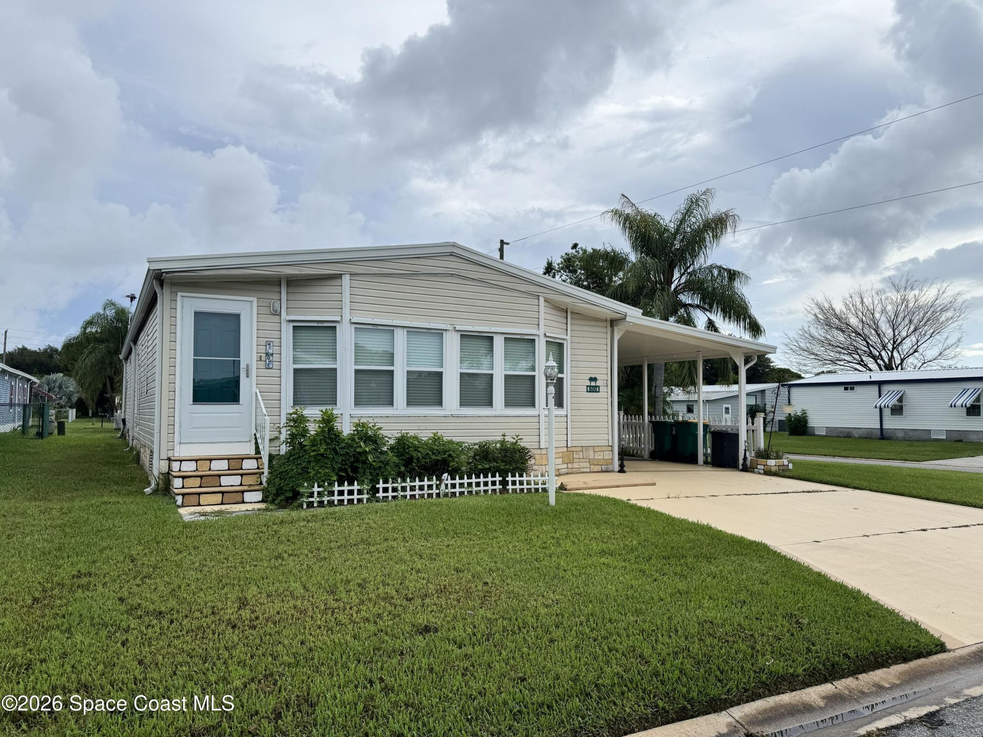 600 N Dolphin Circle , Barefoot Bay, FL 32976 Photo