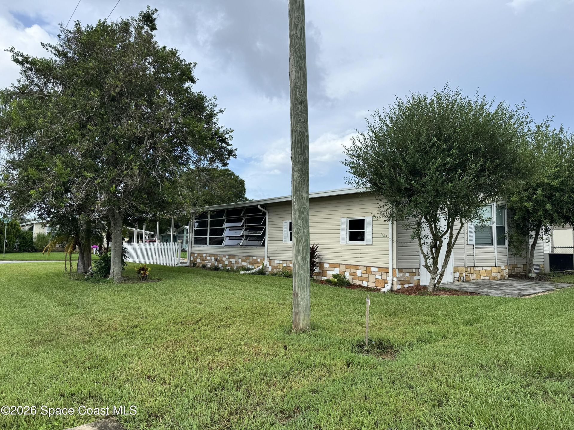 600 N Dolphin Circle , Barefoot Bay, FL 32976 Photo