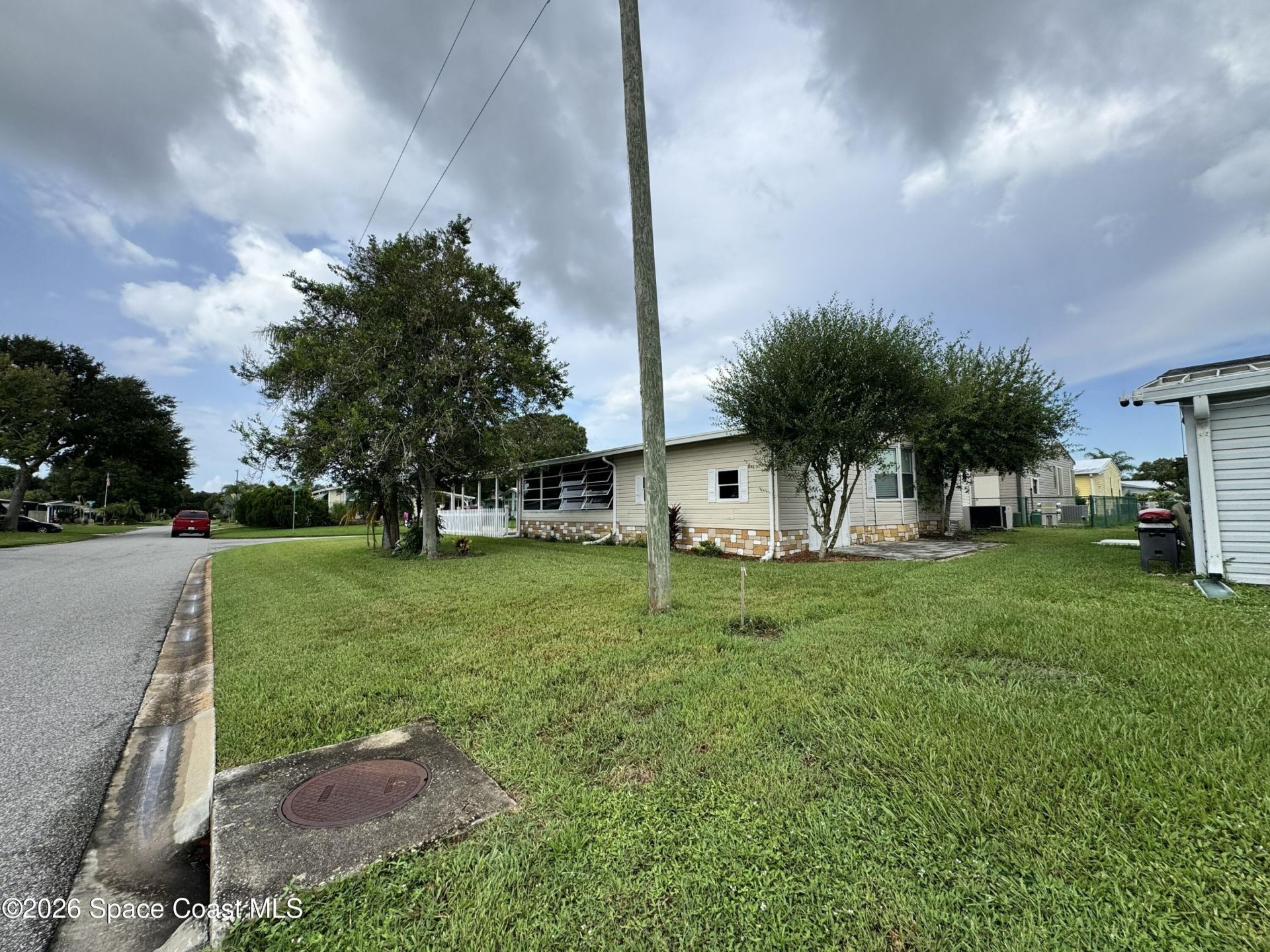 600 N Dolphin Circle , Barefoot Bay, FL 32976 Photo