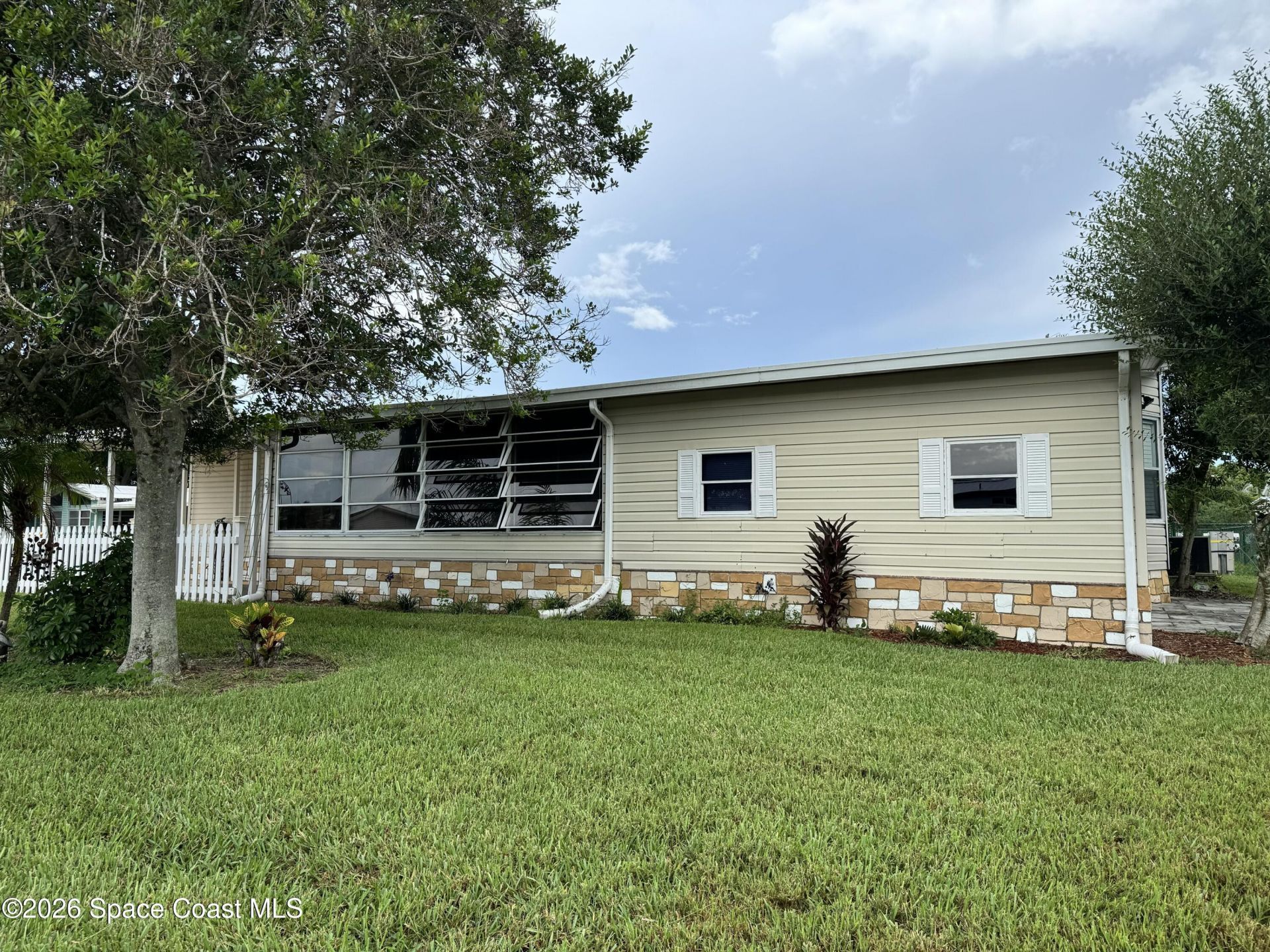 600 N Dolphin Circle , Barefoot Bay, FL 32976 Photo