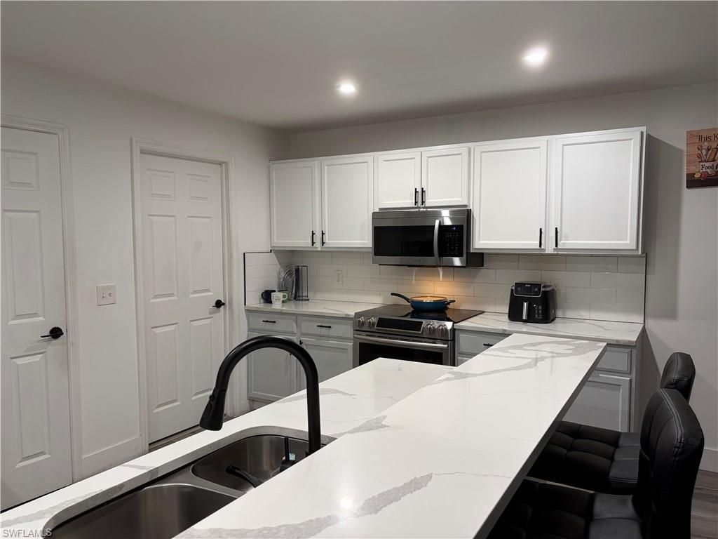 306 Shadow Lakes Dr, Lehigh Acres, FL 33974 Photo